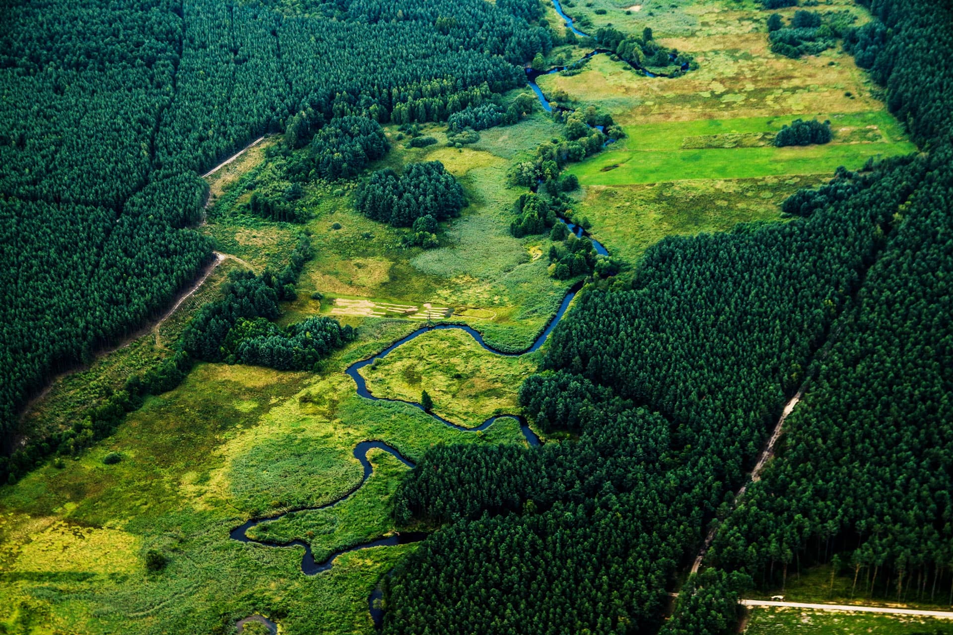 Aerial view of Kenyan landscape with construction site under verification